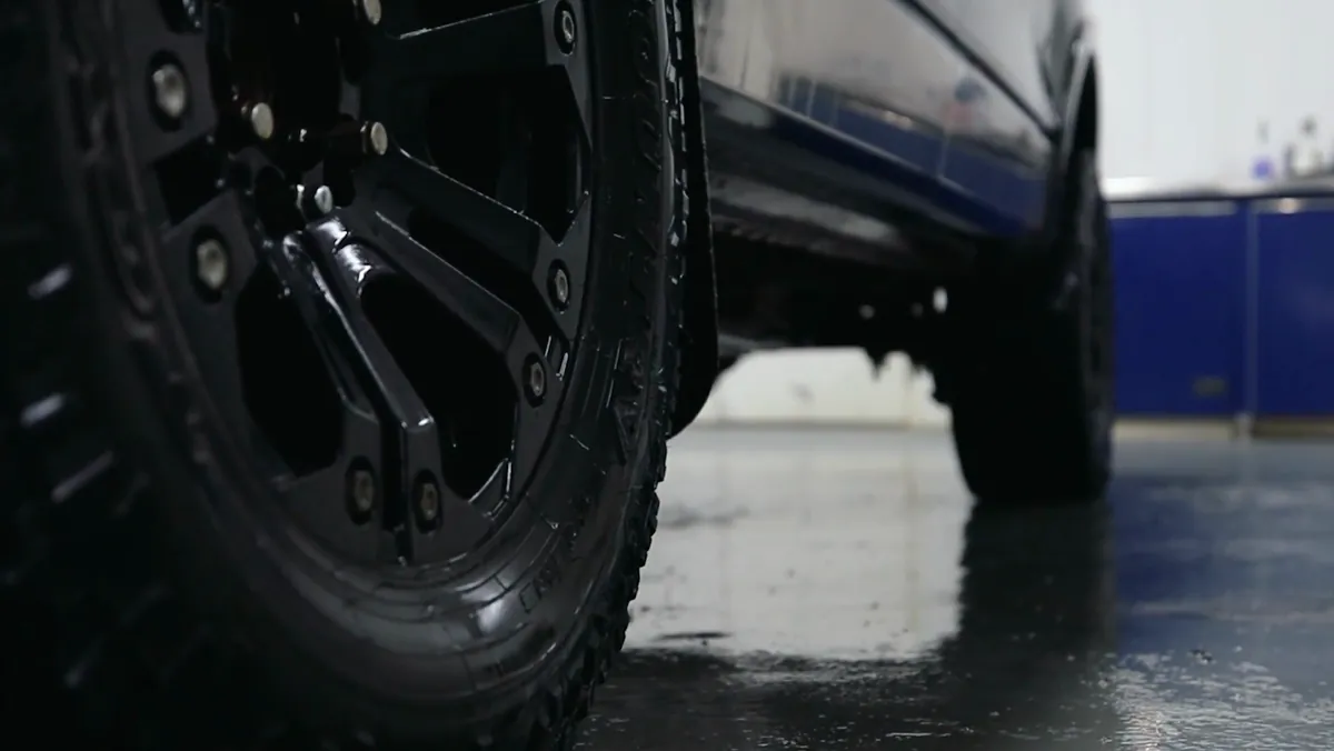 The same wheel after detailing, degreased and finished with tire shine