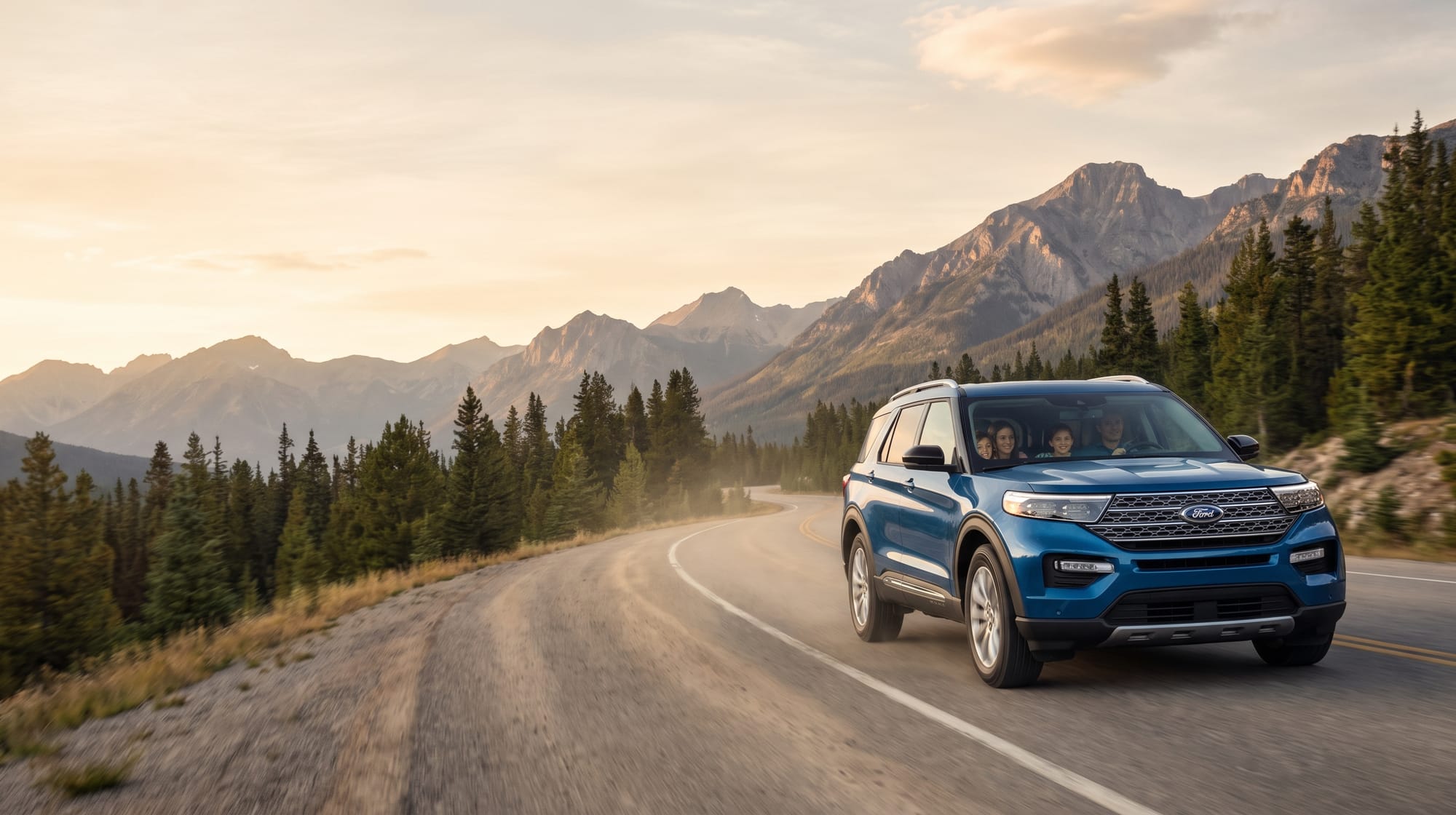 Ford Explorer on a mountain highway at golden hour