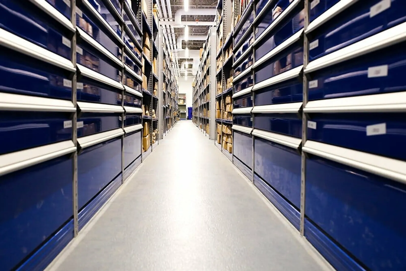 An aisle in the Windsor Ford parts warehouse in Grande Prairie, shelves stacked with genuine Ford parts