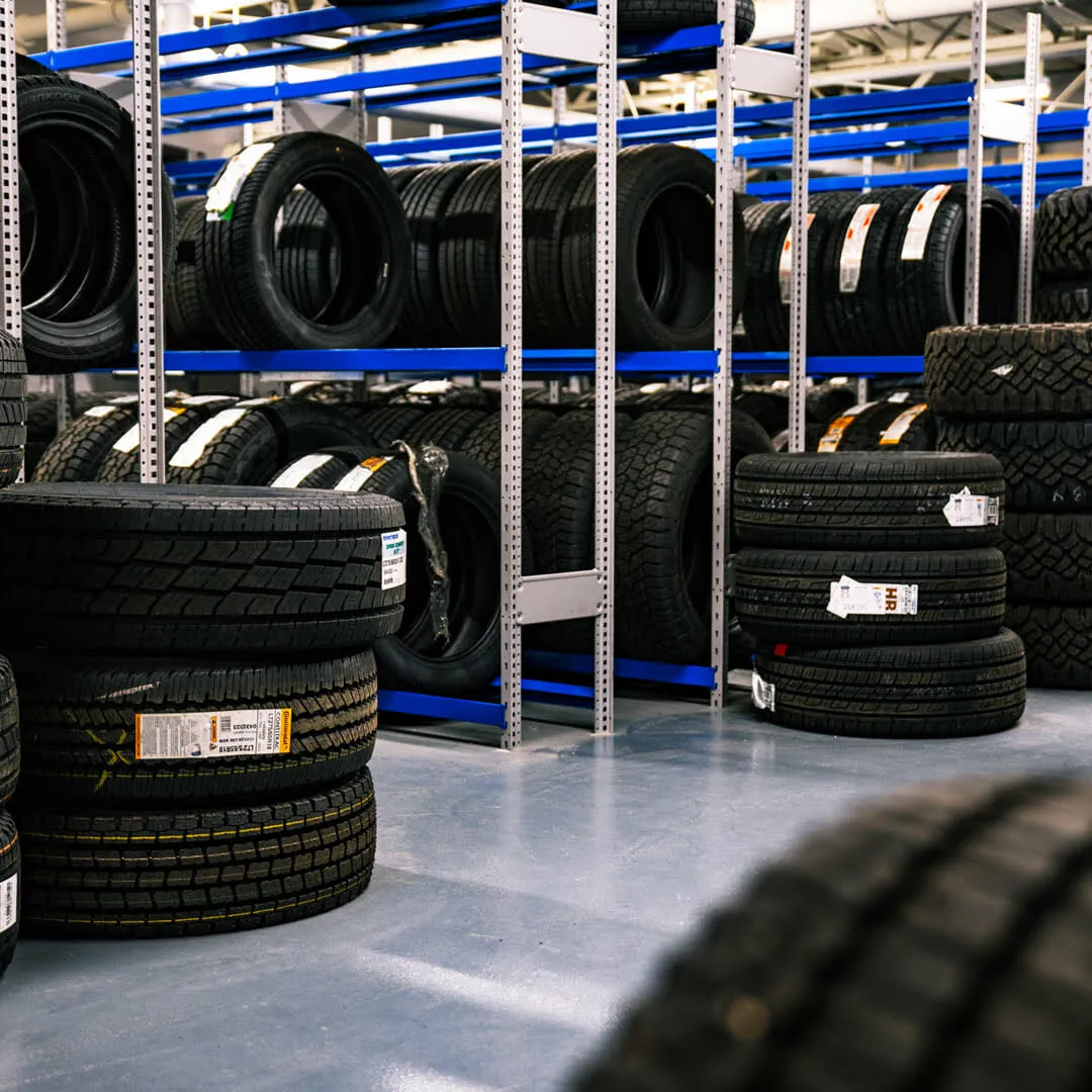 The tire storage room at Windsor Ford, customer tires racked and stacked by season